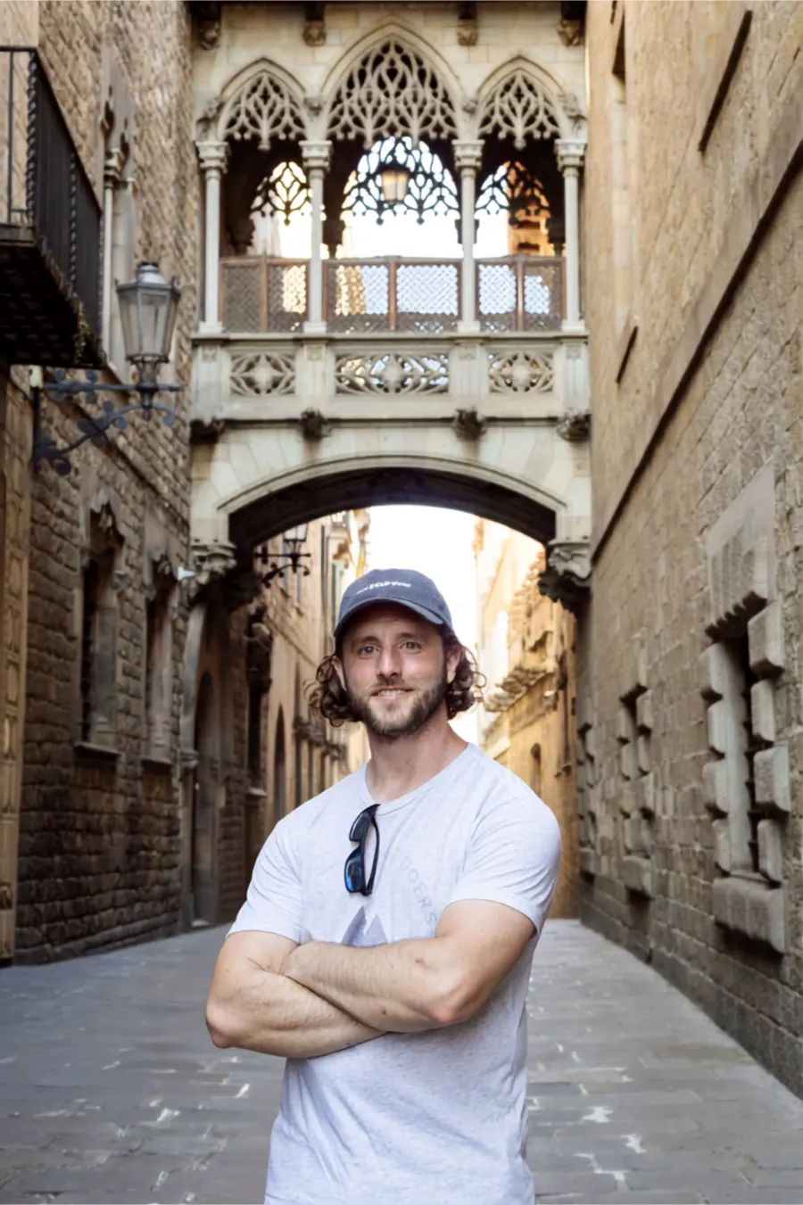 Brian Corder in a stone-walled street in Barcelona's Gothic Quarter